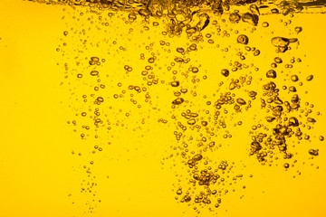 Bubble in liquid yellow color car oil or beer  juice syrup for background