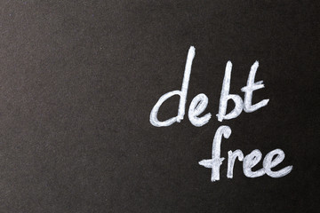 Text DEBT FREE on dark background