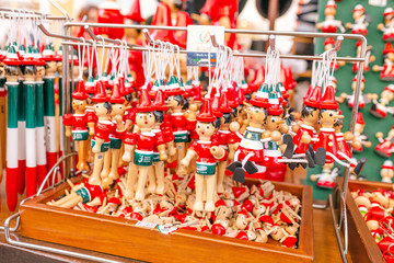  pinocchio puppets toys for sale at touristic shop as souvenirs from Italy