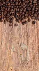 Coffee beans on wood background