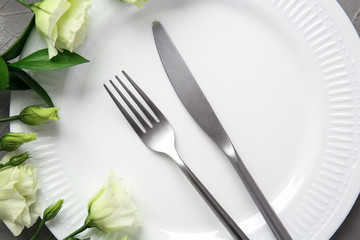 Table setting with floral decor, closeup