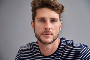 Fototapeta premium Handsome blue eyed guy in studio, portrait