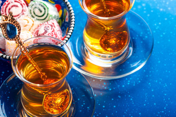 various pieces of turkish delight lokum and black tea