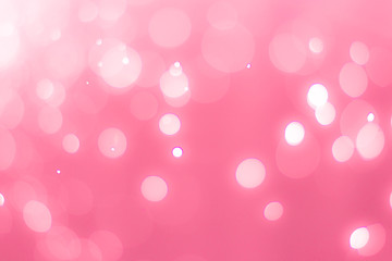 abstract bokeh light effect with soft pink background