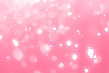 abstract bokeh light effect with soft pink background