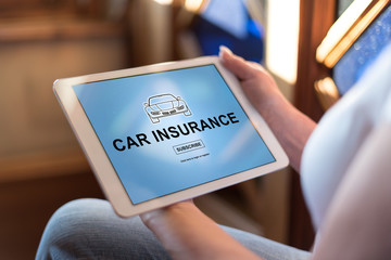 Car insurance concept on a tablet