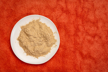 maca root powder on a plate