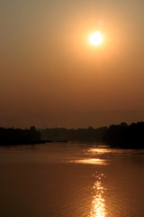 Beautiful views of the sunset over the river in the evening.