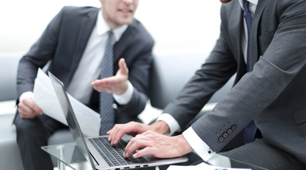 close up. business partners discussing the terms of the contract