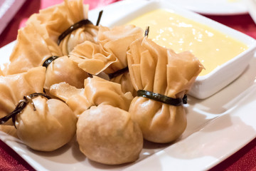 Oriental deep fried wontons filled with prawn and spring onion