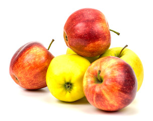 red and white apples on white