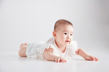 Asian cute baby, shot in studio white background