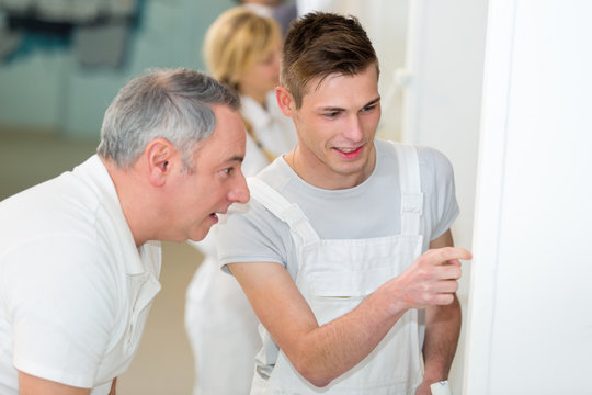 painter with apprentice