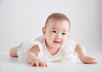 Asian cute baby, shot in studio white background