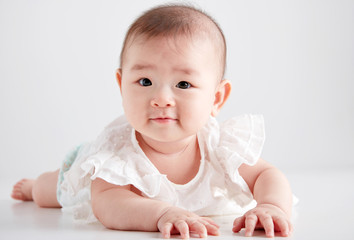 Asian cute baby, shot in studio white background