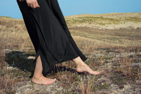 Walk barefoot through the grass