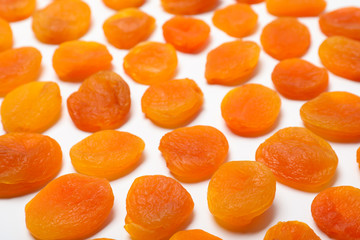 Dried apricots on white background. Healthy fruit