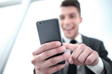 businessman reading a text message