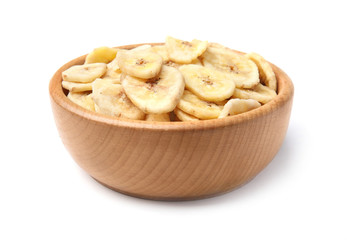 Wooden bowl with sweet banana slices on white background. Dried fruit as healthy snack
