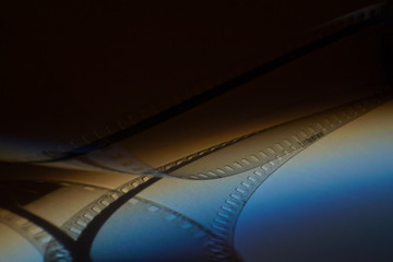 Old film strip on dark background