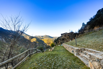 Green garden rural landscape over the mountains