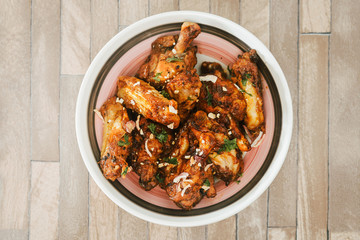 roasted sleeves chicken with potatoes and barbecue sauce