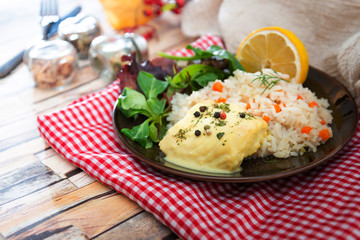 Andalusian fish, saffron rice with vegetables