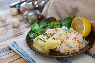 Andalusian fish, saffron rice with vegetables