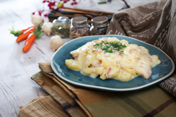 Gratin Of Potatoes, Ham, Eggs And Onions