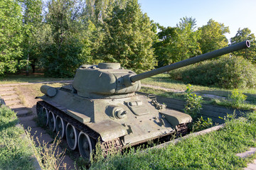 Old soviet retro tank in a trench