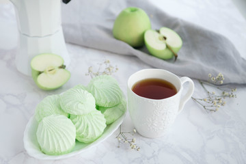 Apple marshmallow with tea