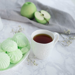 Apple marshmallow with tea