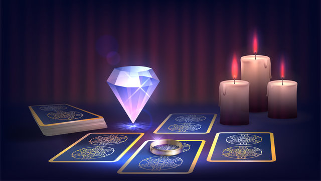 Tarot, candle, ring and magic cristall on the fortune-teller's table, prediction of the future, dark magic