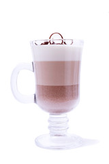 Layered chocolate dessert in an Irish glass mug. Isolated object