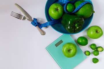 fresh healthy green food on plate with wight. healthy food concept. copy space. white background