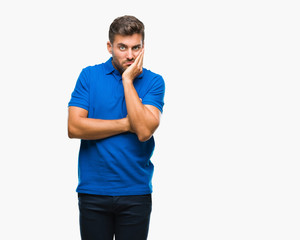 Young handsome man over isolated background thinking looking tired and bored with depression problems with crossed arms.