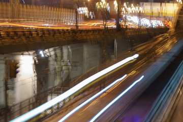 Fototapeta na wymiar City railways on the bridge over Moskva river. Long exposure night image. Translation is 