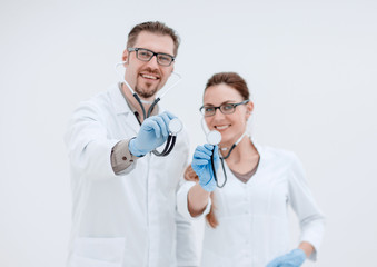 portrait of two successful medical professional with a stethoscope