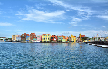 Waterfront with harbour and colorful houses in Curacao.
