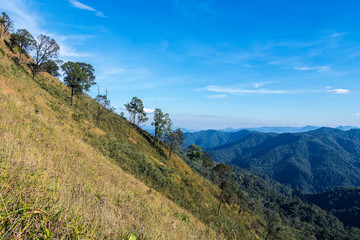 Fototapeta premium Khao Chang Phuak Mountain, Beautiful Mountain with grass field in Thong Pha Phum National Park, Kanchanaburi, Thailand.