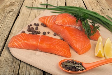 Fresh raw salmon on backgound