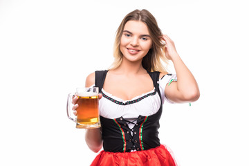 Young and beautiful bavarian girl wear in dirndl with mugs of beer isolated over white background