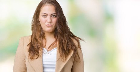 Beautiful plus size young woman wearing winter coat over isolated background depressed and worry for distress, crying angry and afraid. Sad expression.