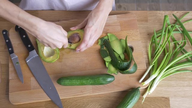 avocado bone removing top view