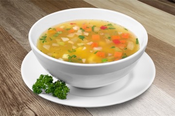 Vegetable soup isolated on a white background - obrazy, fototapety, plakaty