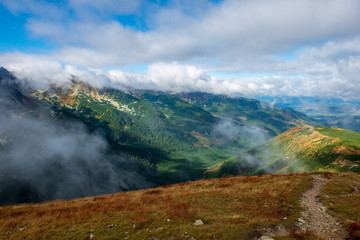 Fototapeta na wymiar walking above clouds in slovakian Tatra mountains