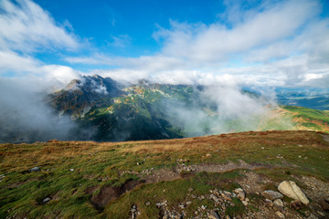 walking above clouds in slovakian Tatra mountains