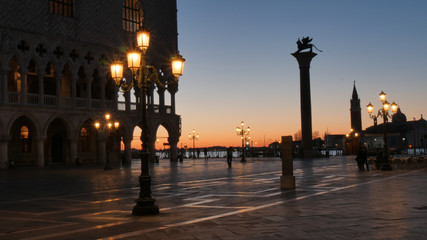 Venice Saint Marco Square Romantic View at Sunrise with nobody and Golden Sun Light