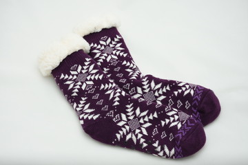 pair of winter wool socks with a pattern. skid socks