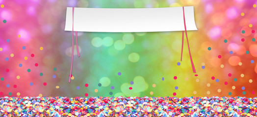 Colorful confetti in front of colorful background with copy space for carnival